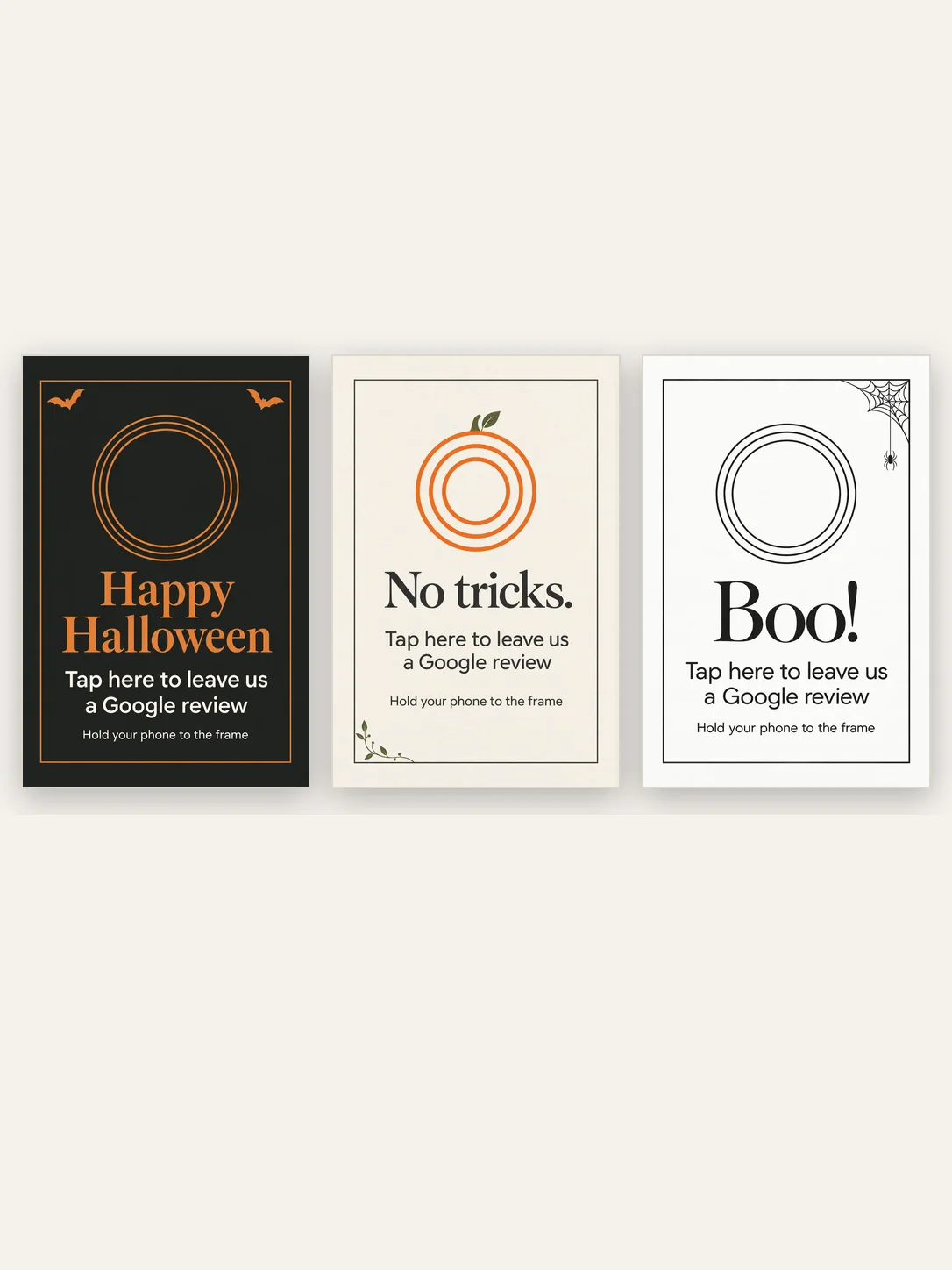 The Halloween bundle: three inserts side by side, Midnight in black and orange, Pumpkin on cream, Web on white
