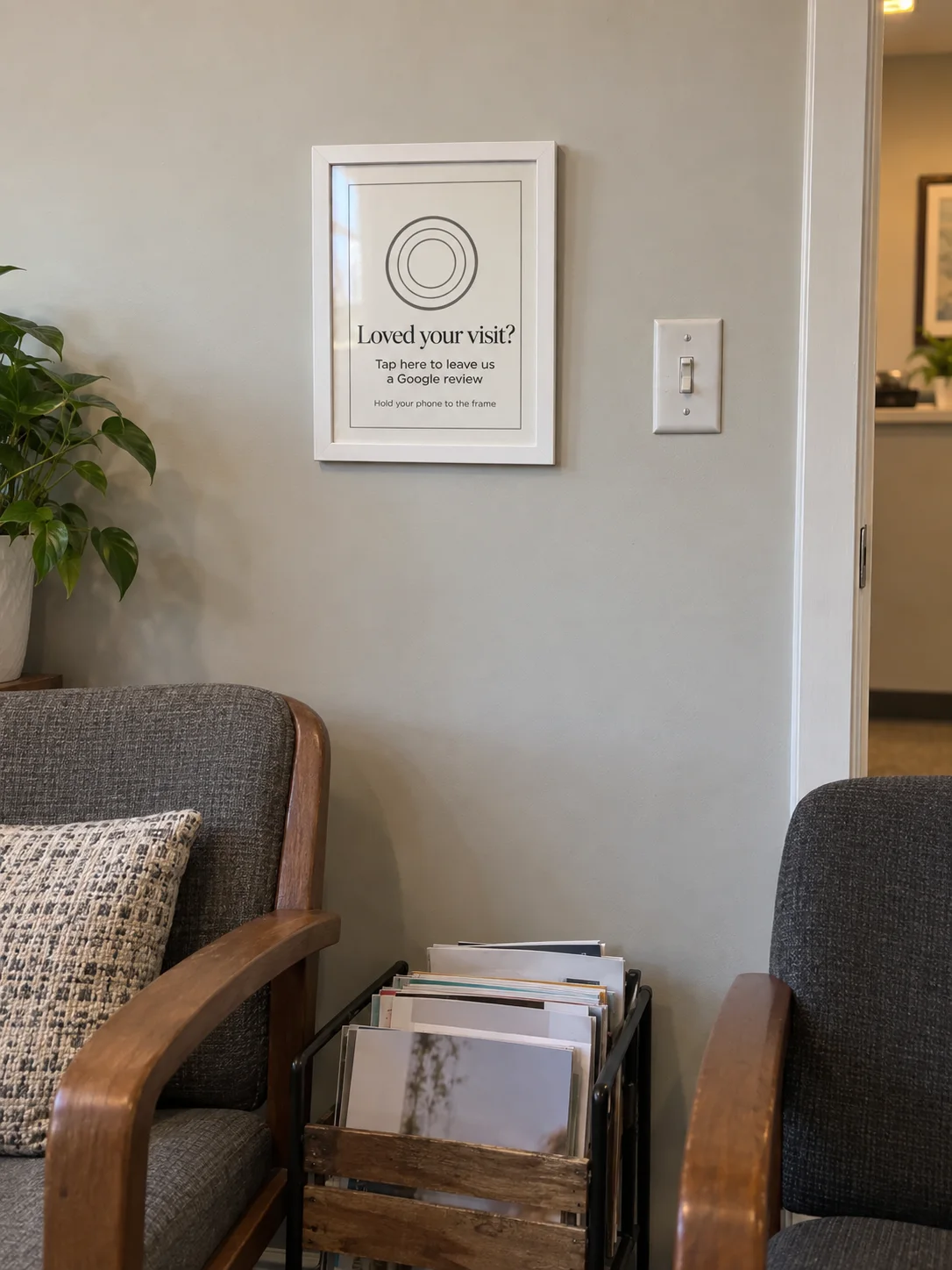 The White 8×10 TapIt Frame hung on a wall at eye level